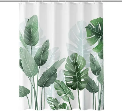 A shower curtain with a green leaf pattern.