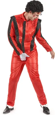 A man wearing a red and black popstar costume.