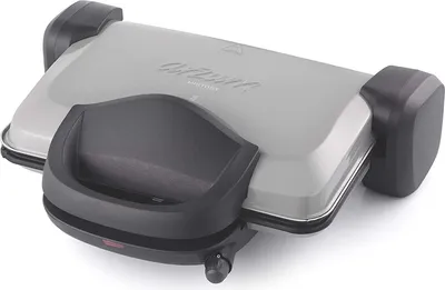 A close-up, angled view of a closed grill and sandwich maker on a white background.