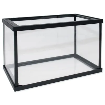 An empty glass aquarium tank with a black frame.