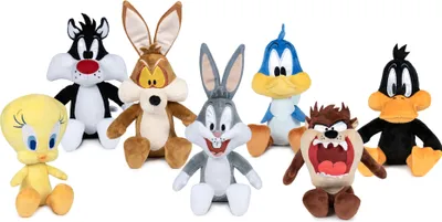 A collection of Looney Tunes character plush toys arranged on a white background.
