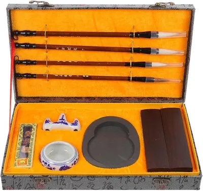 Imagen del producto de Kit de caligrafía china para principiantes, que incluye pinceles de madera, piedra de tinta y tinta para practicar. Diseño portátil y de forma estable, ideal para caligrafía y pintura