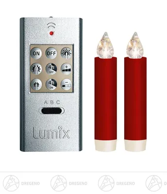 A remote control and two red LED candles are displayed against a white background.