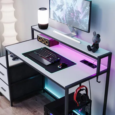 Produktbild von Gaming-Schreibtisch mit 2 Stoffschubladen und LED-Lichtleiste, Computertisch mit Steckdosen, Gaming Tisch, Weiß+Schwarz, Metall+MDF, 128 x 90 x 48 cm