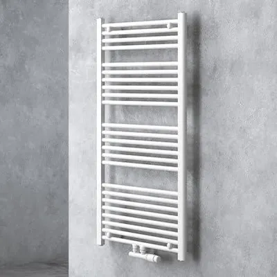 A white radiator is mounted on a textured gray wall.