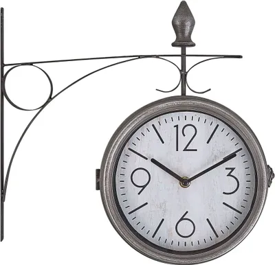 A vintage-style double-sided station clock mounted on a black metal bracket against a white background.