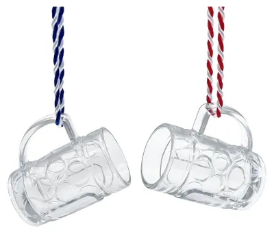 Two small glass beer mugs hanging by their handles.