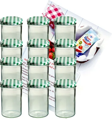 A set of empty glass jars with checkered lids, along with some promotional material for jam making.