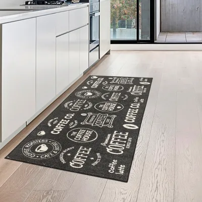 Produktbild von Küchenläufer schwarz mit Gelrücken und Schriftzug in weiß Größe - 67 x 180 cm