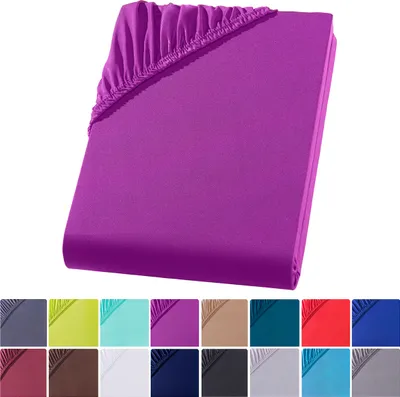 A purple fitted sheet is shown folded on a white background. Below the sheet are swatches of various colors of fitted sheets.