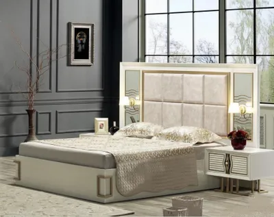 Image de Ensemble de chambre à coucher moderne comprenant un lit et deux tables de chevet.