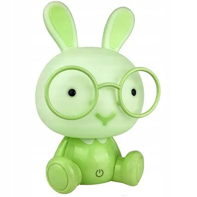 A green, cartoon-like rabbit lamp with glasses, sitting down.