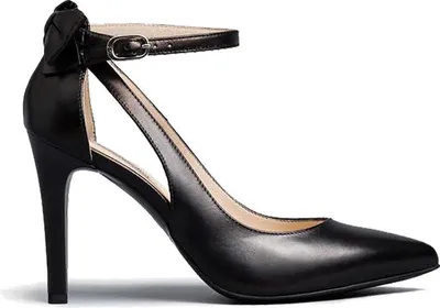 A single black pump shoe with an ankle strap and a bow detail on the back, shown from a side-diagonal view.