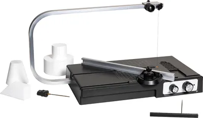 A foam cutting tool with various accessories on a white background.
