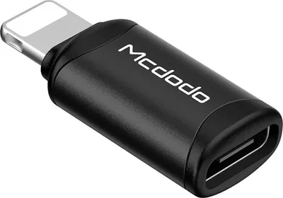 A black USB-C to Lightning adapter with the brand name "Mcdodo" printed on it.