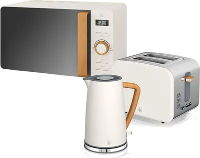 A set of kitchen appliances including a microwave, toaster, and kettle.