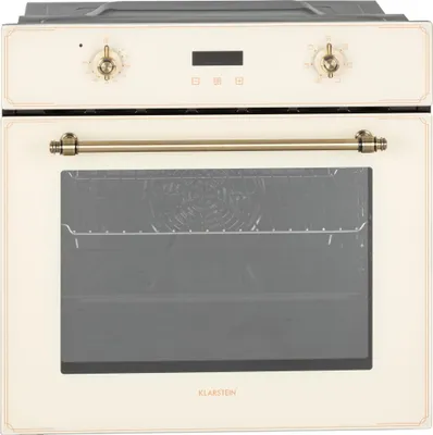 A front view of a cream-colored electric built-in oven with brass-colored accents.