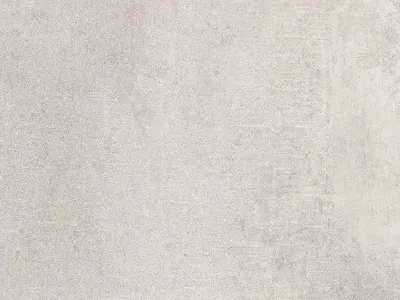 A close-up, textured view of a light concrete-look vinyl flooring tile.