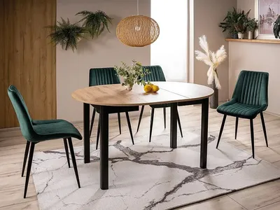 A dining table with chairs in a room setting.