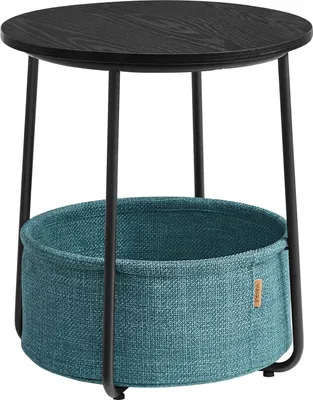 A round side table with a black top and black legs, featuring a teal fabric basket underneath.