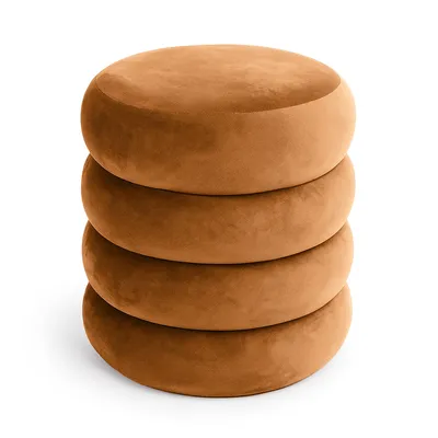 A stack of four round, brown velvet ottomans.