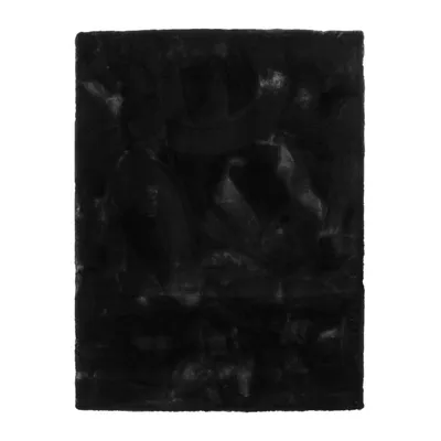A black rug with a textured surface.