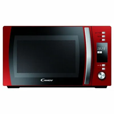 A red Candy microwave oven shown from the front.