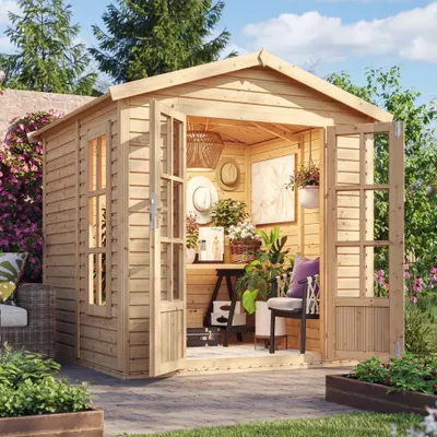 A wooden garden shed with its doors open, decorated with plants and home decor, set in a garden.