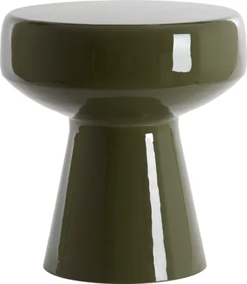A green ceramic stool on a white background.