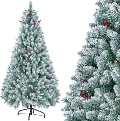 A flocked artificial Christmas tree with red berries and pinecones, shown against a white background.
