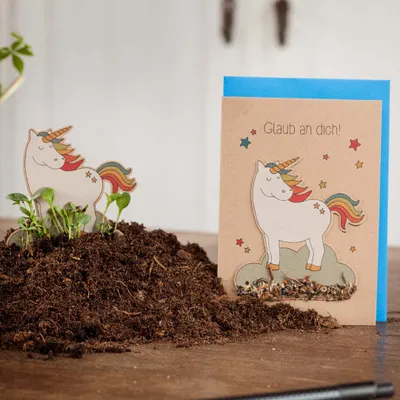 Produktbild von Einhorn-Karte 'Glaub an Dich' - Saatstecker Karte mit Einhorn - mit eingearbeiteten Wildblumensamen - Grußkarte, Motivationskarte mit Saatgut
