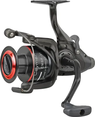 A black and red fishing reel is shown against a white background.