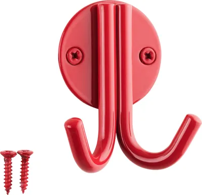 A red double hook mounted on a white background, with two red screws in the lower left corner.