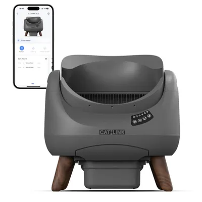 A smart self-cleaning cat litter box and a smartphone displaying its app interface.