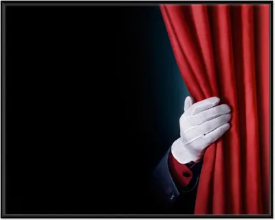 Produktbild von Wallario Wandbild Vorhang auf für die Show  Hand hinterm roten Vorhang, Größe: 40,30 x 50,30 cm, Poster mit schwarzem Aluminiumrahmen