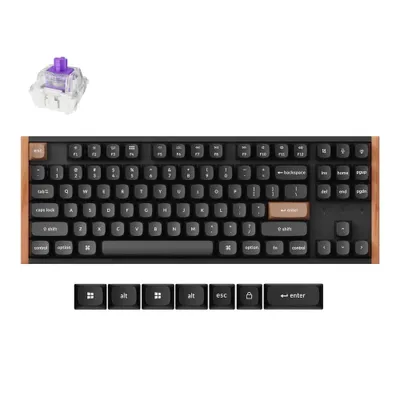 A mechanical keyboard with a wooden frame and a separate keyboard switch.