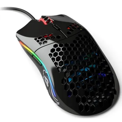 A black gaming mouse with honeycomb cutouts and RGB lighting, shown from a diagonal angle on a white background.