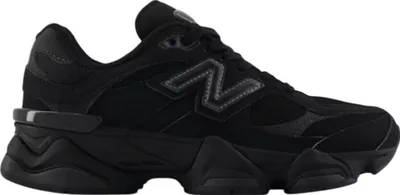 A black New Balance 9060 sneaker shown from the side against a white background.