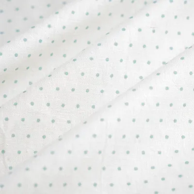 Imagen del producto de Tejido de algodón, crepé, color celadón, estampado de puntos, 150 cm de ancho, certificado
