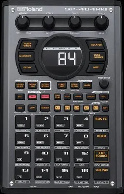 Image de Roland Sampler SP-404 MKII séquenceur mobile avec casque d'écoute