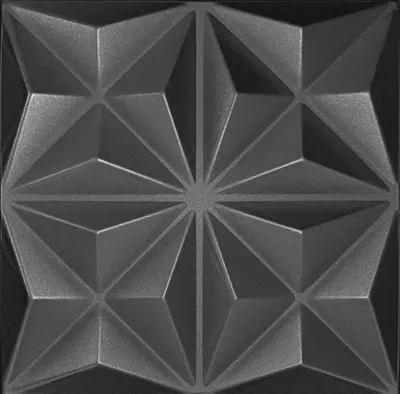 A close-up, textured, geometric pattern on a dark background.