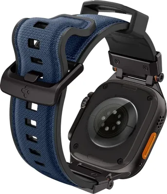 Close-up view of the back of a smartwatch with a navy blue fabric strap.