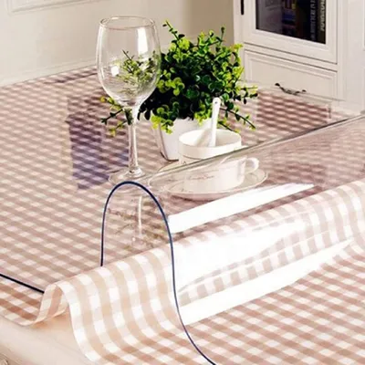 Produktbild von Transparente Tischschutzfolie 100 x 200 cm - Wasserdicht & Einfach zu Reinigen - Idealer Schutz für Jeden Tisch