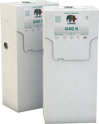 Two tall, white cardboard boxes of wallpaper rolls are shown. The box in the foreground is slightly to the right, and the box in the background is to the left and slightly behind.