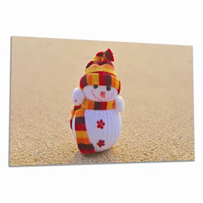 Produktbild von Wallario Herdabdeckplatte aus Glas, Größe 90 x 52 cm 1-teilig, Motiv Schneemann am Strand