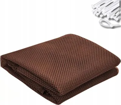 A folded brown mesh safety net with white ties in the upper right corner, set against a white background.