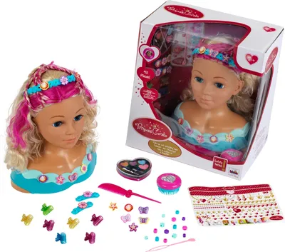 A styling head and its accessories are displayed next to its packaging.