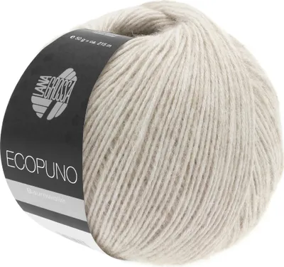A ball of beige yarn with a black label.