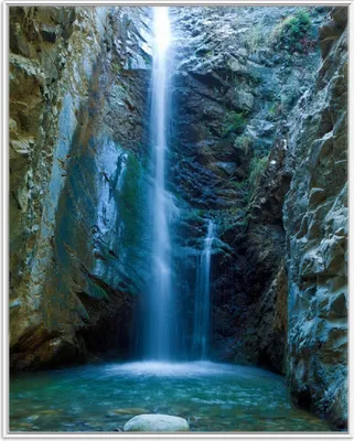 Produktbild von Wallario Wandbild Wasserfall bei Sonneneinfall, Größe: 40,30 x 50,30 cm, Poster mit weißem Aluminiumrahmen