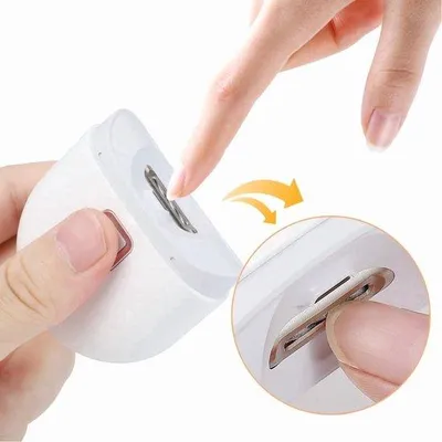 Produktbild von Elektrische nagelknipper mit LED-Licht und zwei Geschwindigkeitsstufen, inklusive Nagelknipper und Trimmer.